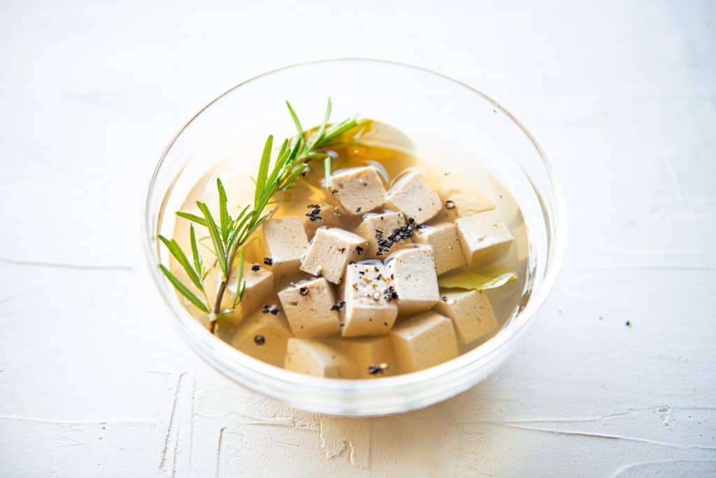 marinating tofu cubes